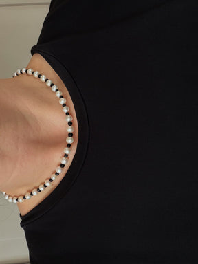 Duality necklace