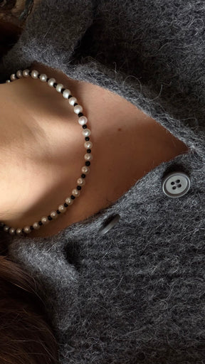 Duality necklace